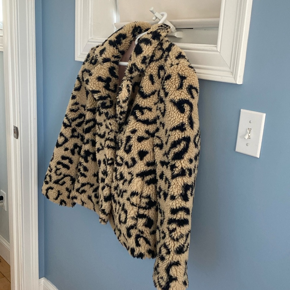 Dylan, so cute! Faux fur jacket, size M, black and tan.